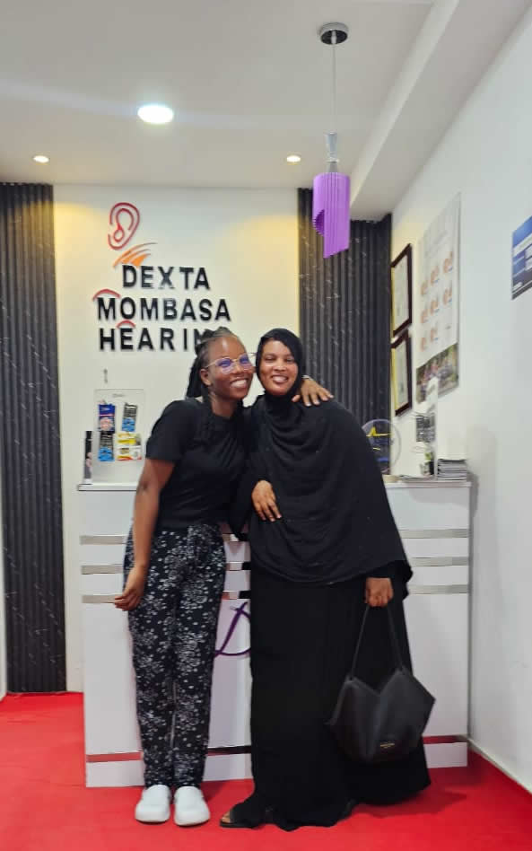 A happy patient with a Dexta team member in Mombasa